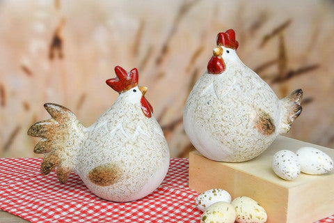Gallo e gallina bianco e beige