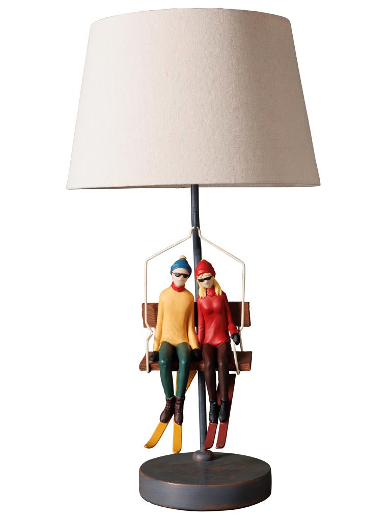 Lampada da tavolo con seggiovia