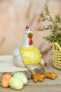 Gallo con zampe pendenti